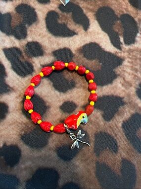 Hand Crafted Red and Yellow Beaded Parrot Charm Bracelet